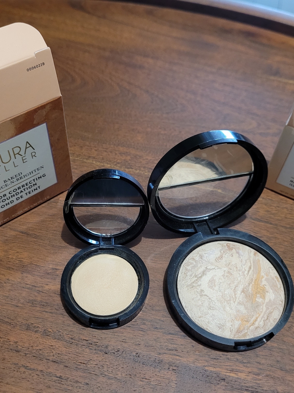 Laura Geller Baked Powder in Fair and Highlighter in French Vanilla